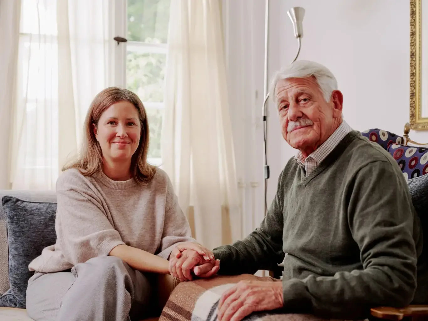 Pflegende Angehörige mit Senior